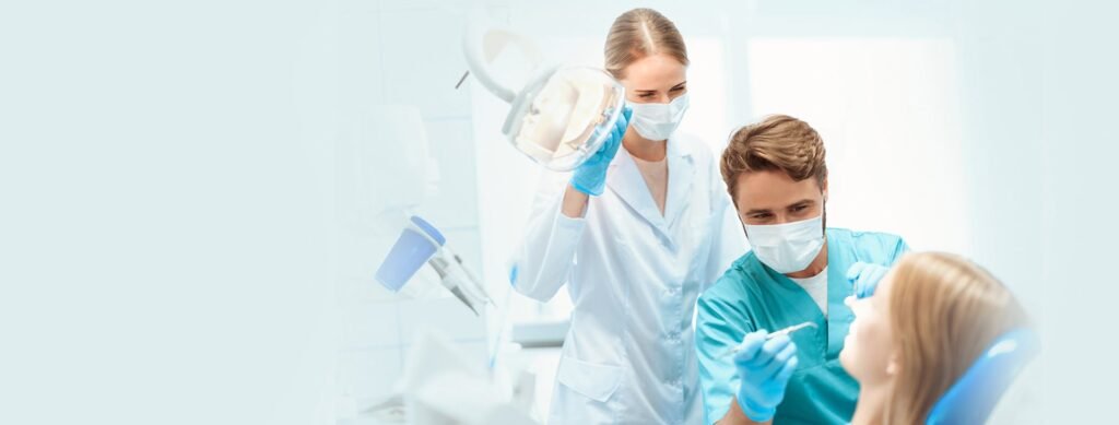 Dental team welcoming a young patient at Peridot Dental Care