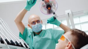 Porcelain dental crown shade matching at a dental clinic in Woodbridge