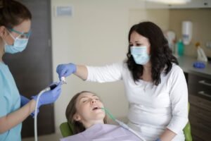 Patient resting in a dental chair after local anaesthetic for a filling