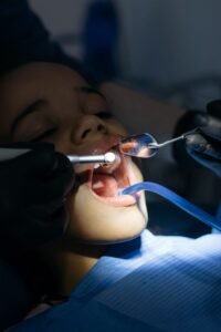 Child relaxing during a gentle dental checkup with comfort-focused care