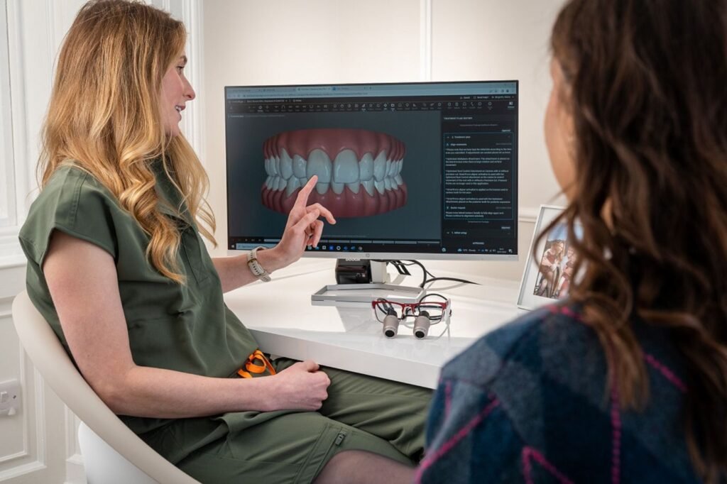 Dentist explaining emergency dental treatment options to a patient in Woodbridge