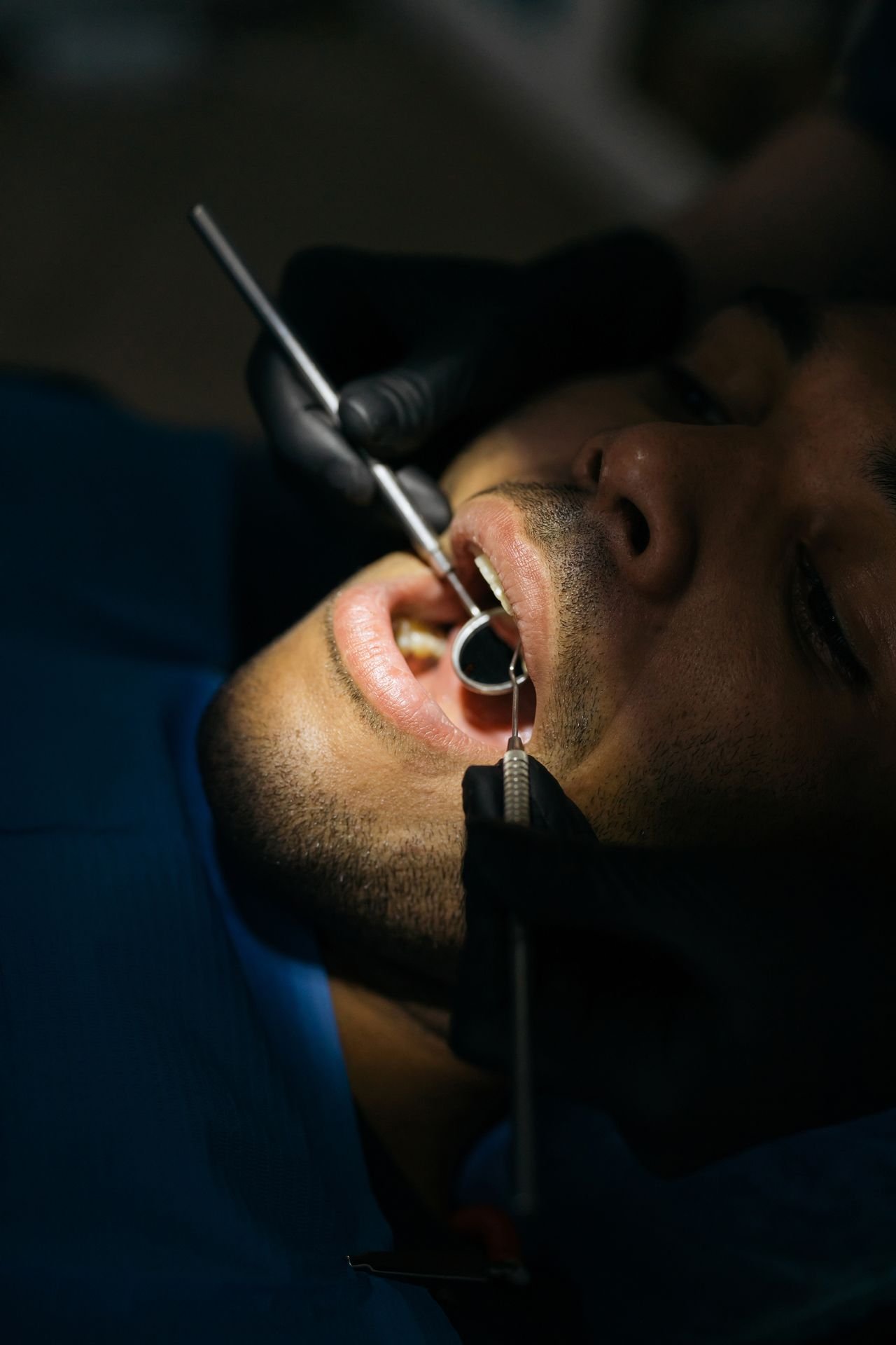 Man having a dental checkup after a tooth injury