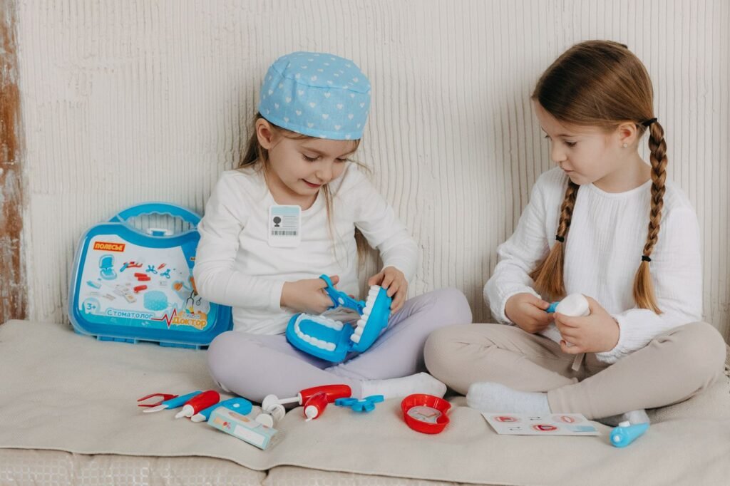 Kids playing dentist at home to prepare for a pediatric dental visit in Woodbridge