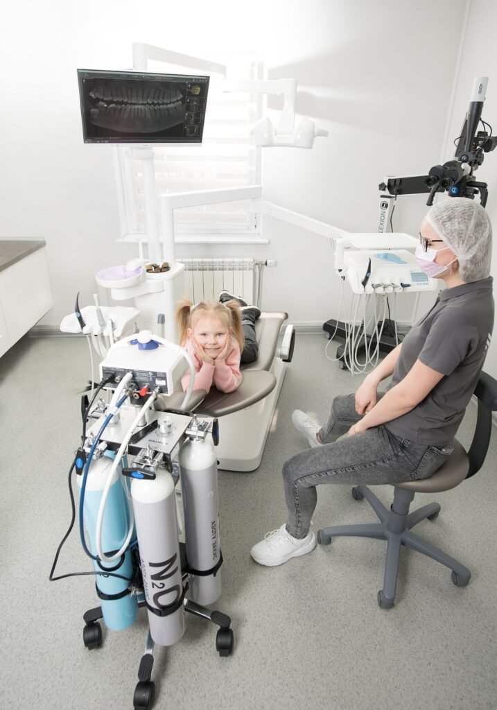Happy child with a kids dentist in Woodbridge