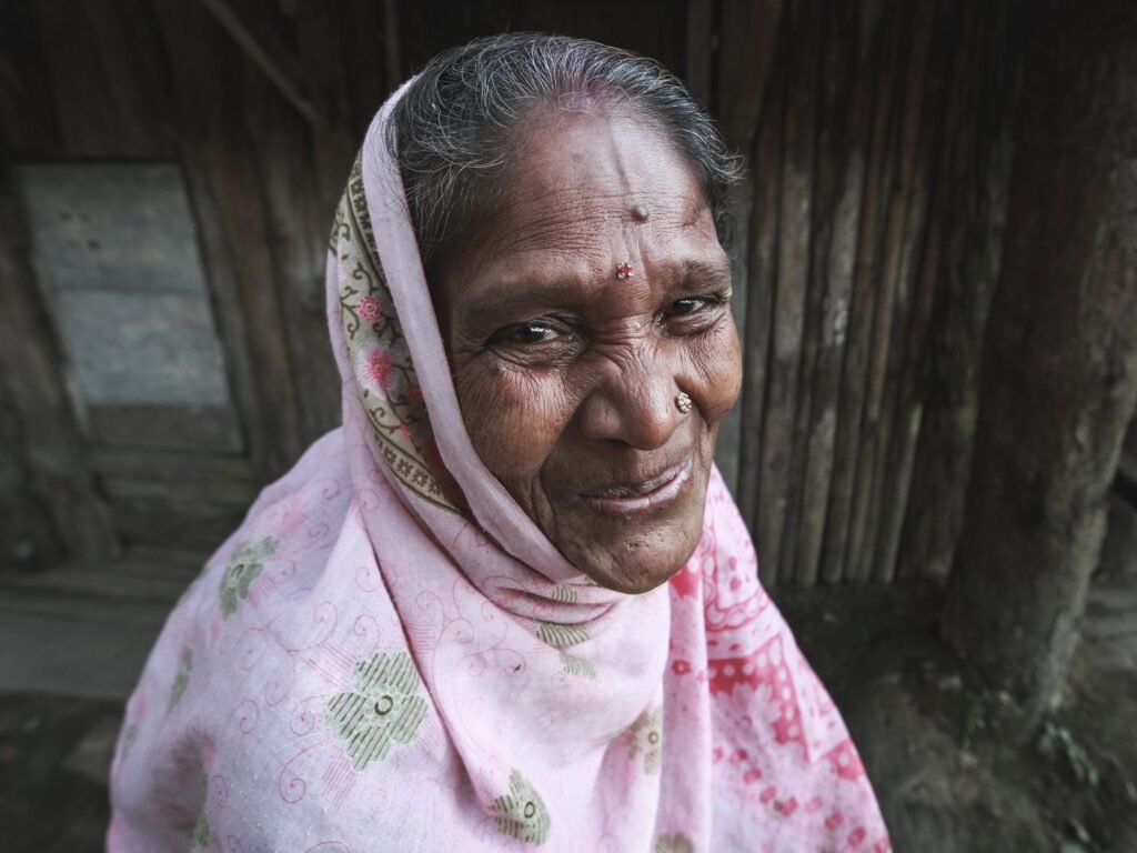 Senior woman smiling while healing after dental surgery
