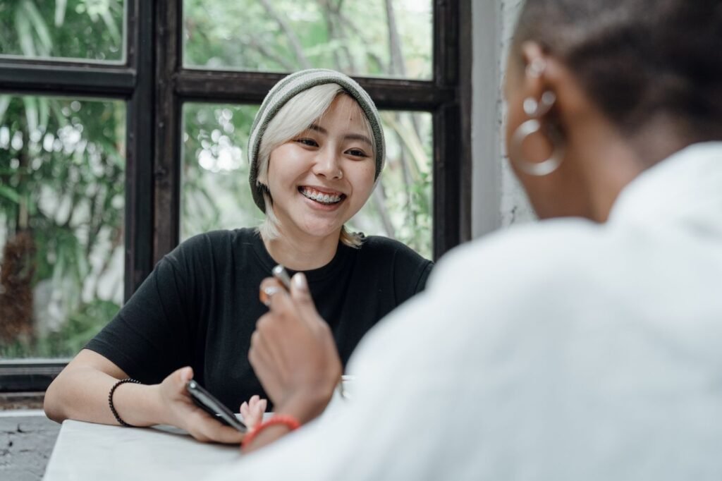 Smiling woman with a natural-looking restored tooth